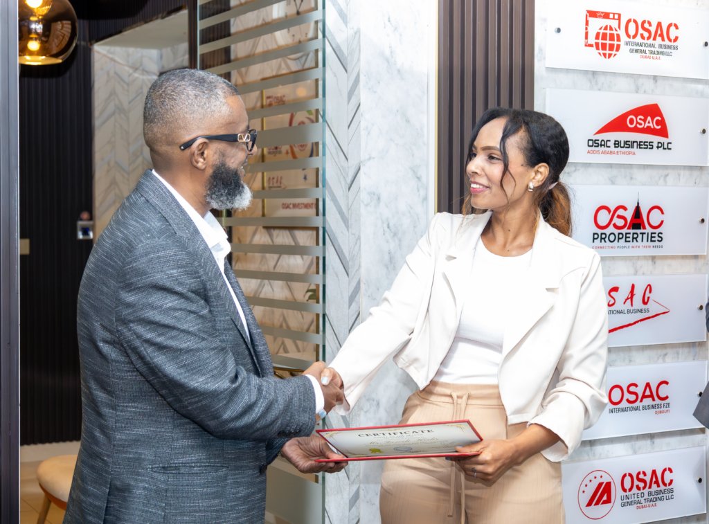 Osman Abdu Wahabrebi Ceo of osac properties and Zewdi Mekonen Agent of the month at  osacproperties